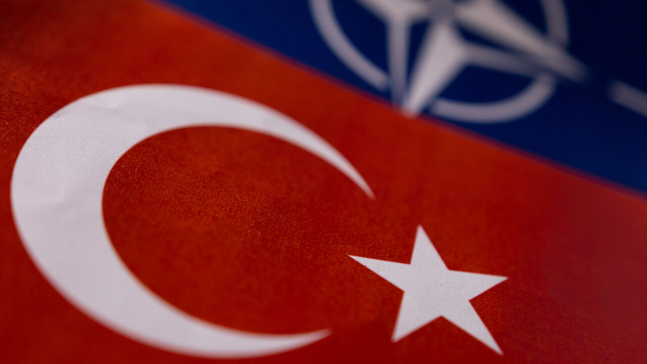 FILE PHOTO: NATO and Turkish flags are seen in this illustration taken May 18, 2022. REUTERS/Dado Ruvic/Illustration/ File Photo