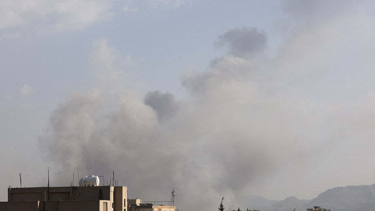 Smoke rises from the sites of Israeli airstrikes in Sanaa, Yemen September 25, 2025. REUTERS/Stringer