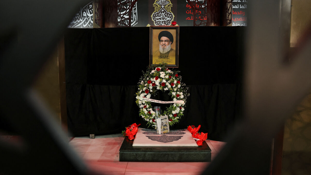A picture depicting late Hezbollah leader Hassan Nasrallah at the Burial site ahead of the first anniversary of his assassination, on the outskirts of Beirut, Lebanon September 24, 2025. REUTERS/Mohamed Azakir