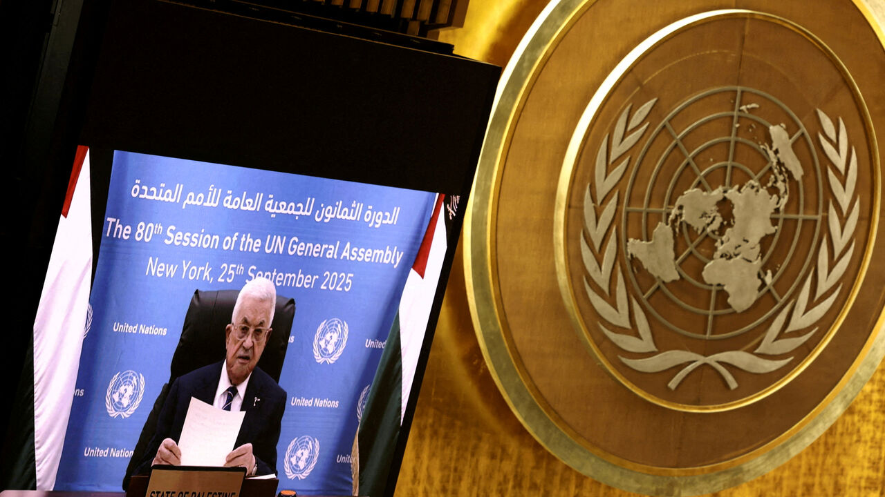 FILE PHOTO: Palestinian President Mahmoud Abbas addresses the 80th United Nations General Assembly via video, at U.N. headquarters in New York, U.S., September 25, 2025. REUTERS/Caitlin Ochs/File Photo