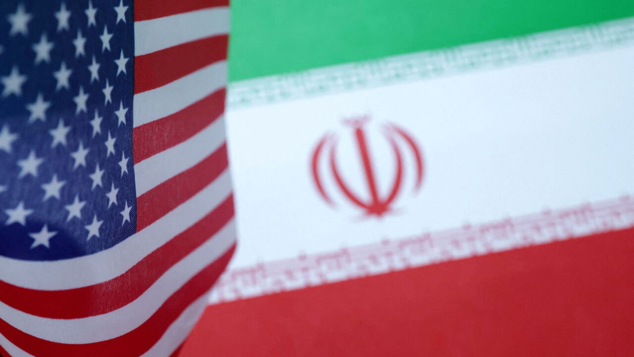 FILE PHOTO: U.S. and Iran flags are seen in this illustration created on June 18, 2025. REUTERS/Dado Ruvic/Illustration/File Photo