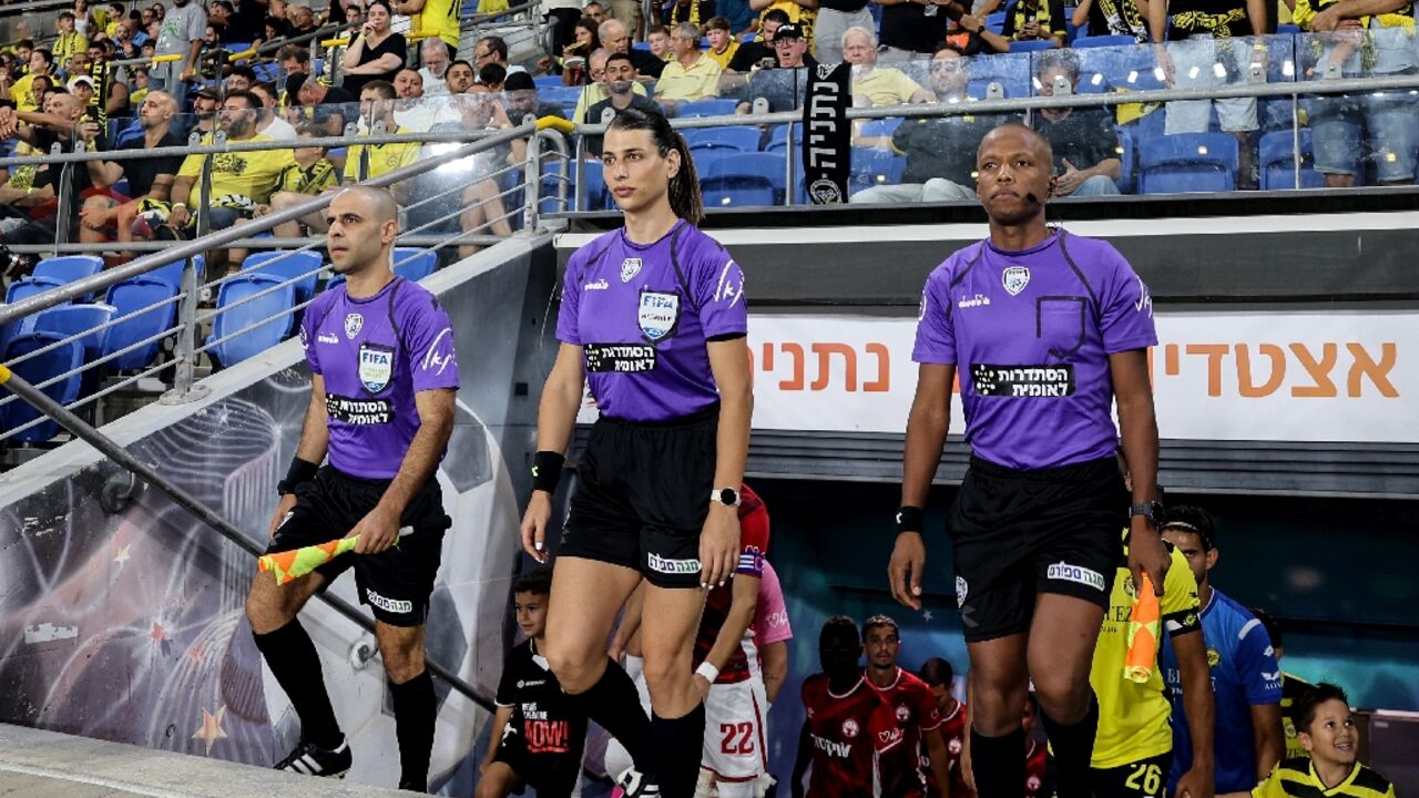 Israeli referee Sapir Berman (C) became the first transgender woman to officiate an international football match