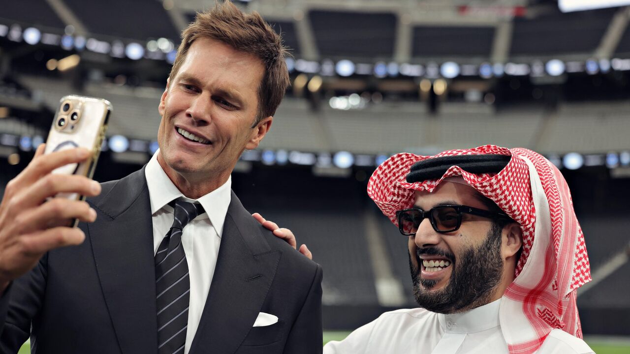Tom Brady and head of Saudi Arabia’s General Entertainment Authority, Turki al-Sheikh, unveil the flag football tournament in Las Vegas on Sept. 17, 2025.