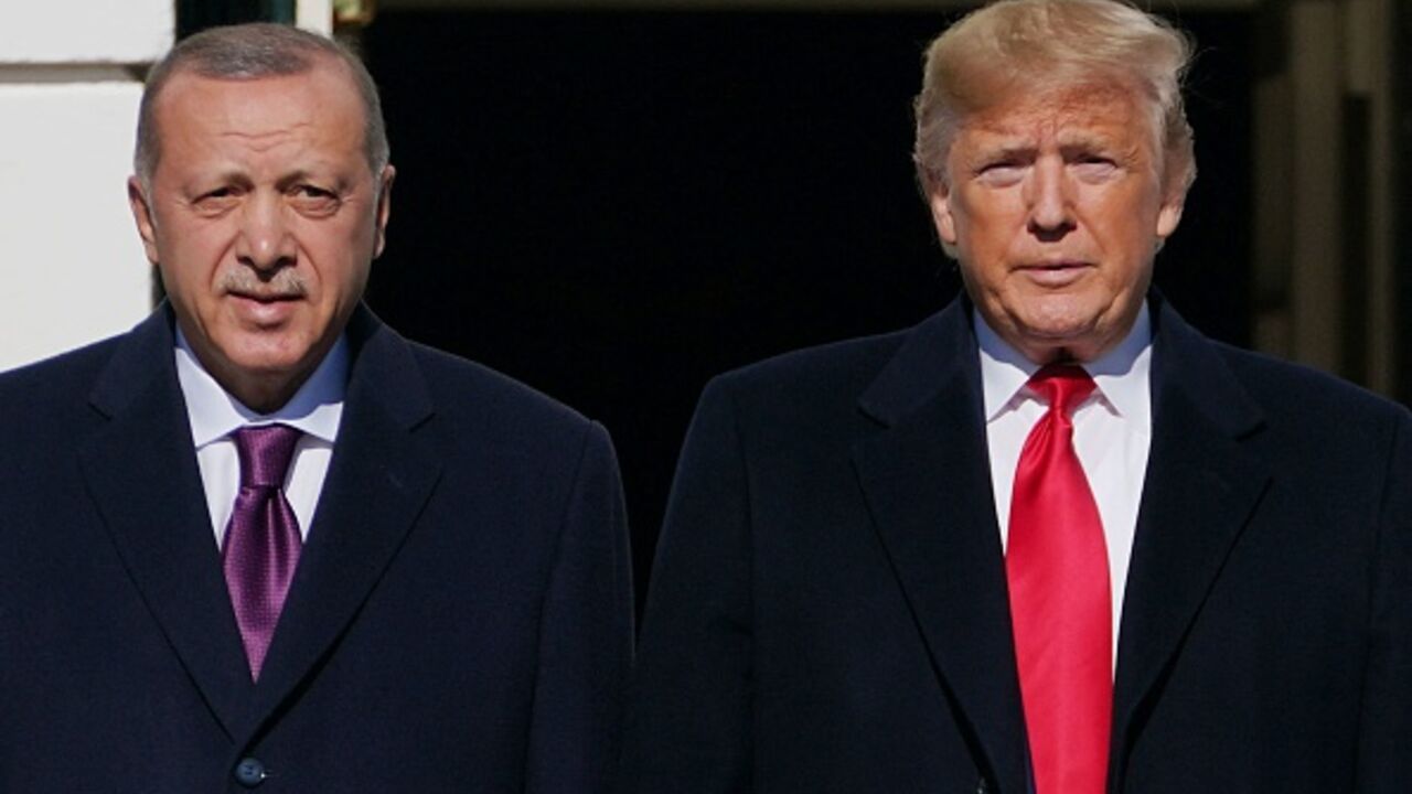 US President Donald Trump greets Turkey's President Recep Tayyip Erdogan outside the White House in Washington, DC on November 13, 2019. (MANDEL NGAN/AFP via Getty Images)