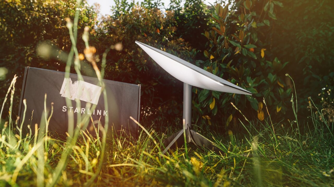 Ray of sun over the box and antenna during Unbox reliable data transmission and connection with SpaceXs Starlink.