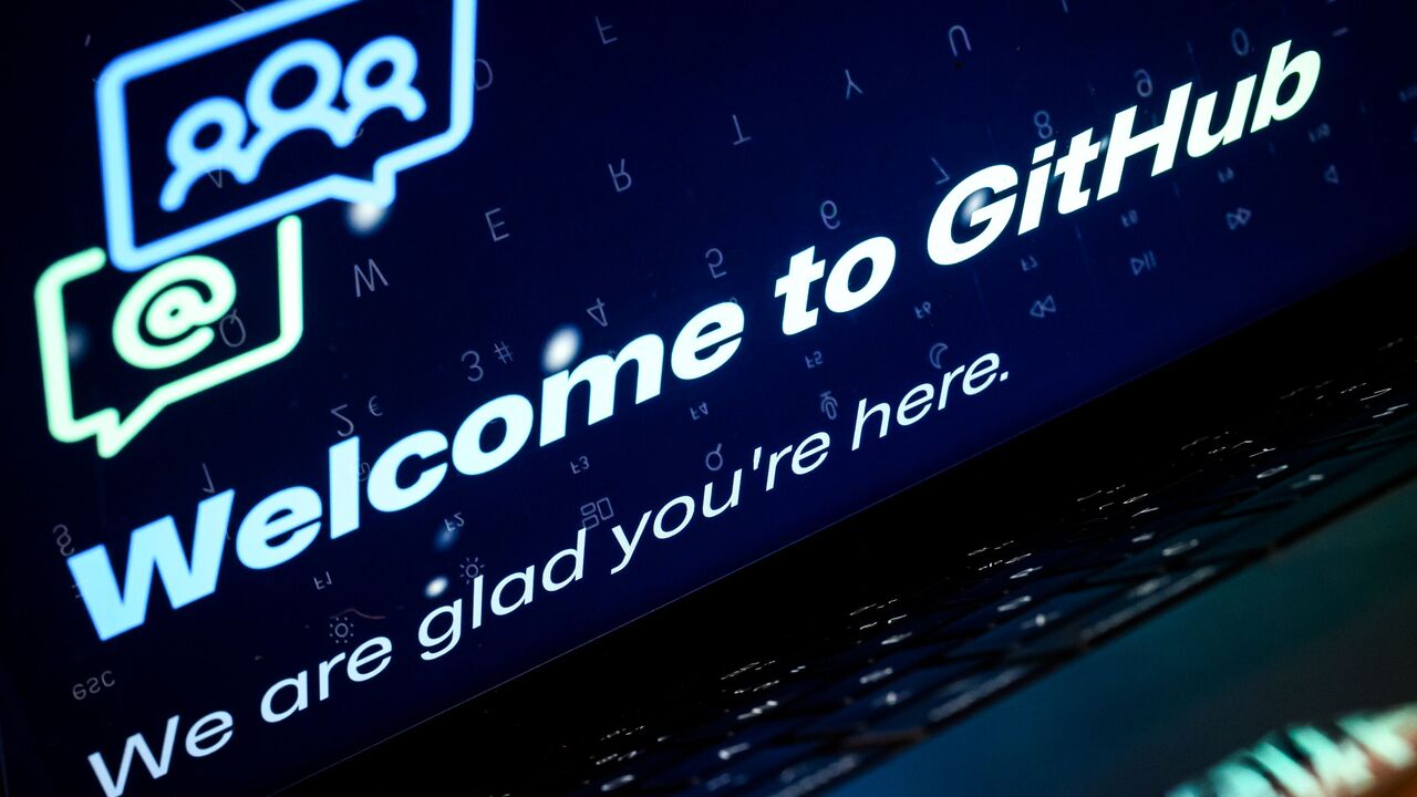  A photo illustration shows a laptop screen displays welcome screens and messages on the Github developer platform website, on February 23, 2024 in London, England. 