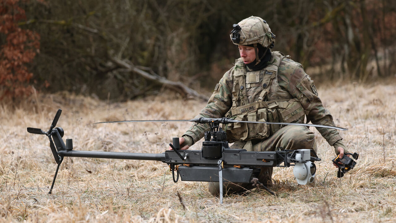 A soldier of a UAS (Unmanned Aircraft System) platoon of the U.S. Army 3rd Brigade, 10th Mountain Division, readies a Anduril Ghost-X helicopter surveillance drone for take-off during the Combined Resolve 25-1 military exercises at the Hohenfels Training Area in Bavaria on Feb. 3, 2025 near Hohenfels, Germany. 