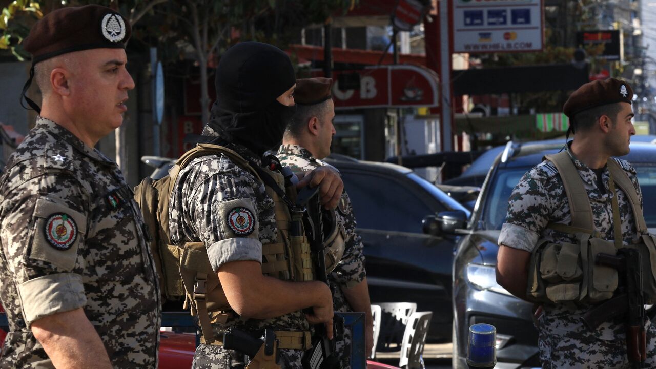 Lebanese army soldiers stand guard near a polling station during the municipal elections in Nabatieh in southern Lebanon on May 24, 2025.