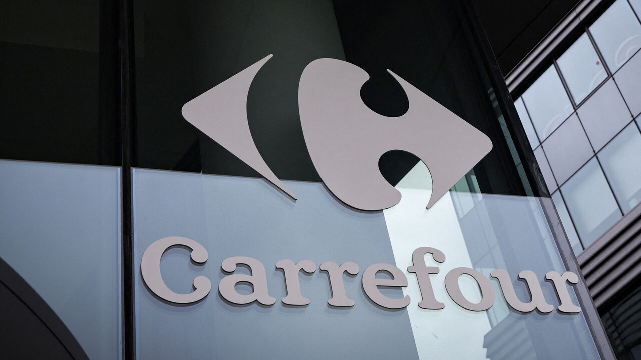 This photograph shows Carrefour's logo displayed on the headquarters building in Massy, near Paris, on May 28, 2025.