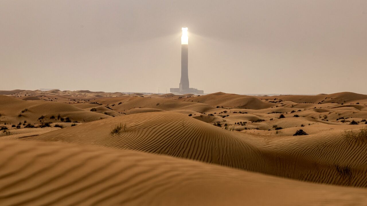 The tallest solar power tower in the world at 260 meters is pictured at the concentrated solar thermal power Noor Energy 1 solar complex at Mohammed bin Rashid Al Maktoum Solar Park, about 50 kilometers south of Dubai, on July 19, 2025.