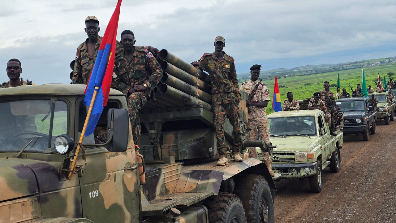 Sudanese army soldiers parade in the streets of eastern Sudan's city of Gedaref on Aug. 14, 2025 to mark the 71st anniversary of the formation of the Sudanese army. 