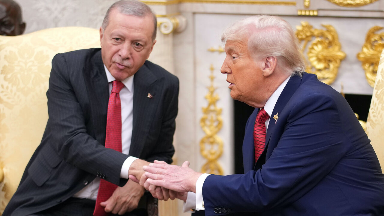 President Donald Trump (R) shakes hands with President of Turkey Recep Tayyip Erdogan during a meeting in the Oval Office at the White House on Sept. 25, 2025 in Washington, DC.