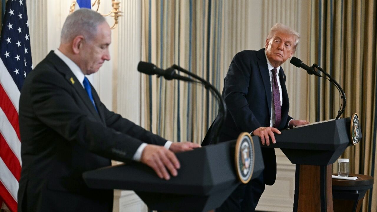 US President Donald Trump and Israeli Prime Minister Benjamin Netanyahu(L) participate in a press conference in the State Dining Room of the White House in Washington, DC on September 29, 2025.