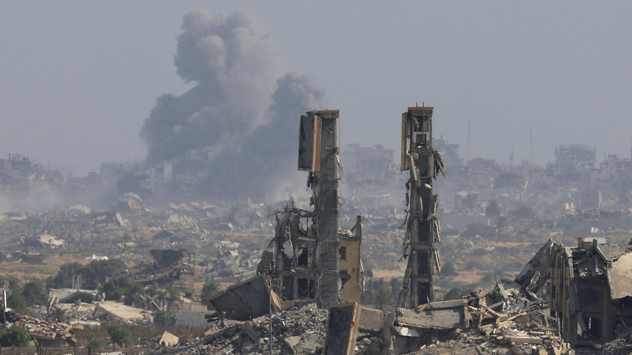 Smoke rises following explosions in Gaza City after Hamas agreed to release hostages and accept some other terms in a U.S. plan to end the war, as seen from central Gaza Strip October 4, 2025. REUTERS/Dawoud Abu Alkas