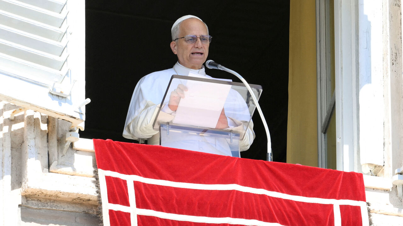 Pope Leo XIV speaks as he appears to lead the weekly Angelus prayer, at the Vatican, September 21, 2025.   Vatican Media/Mario Tomassetti/Handout via REUTERS