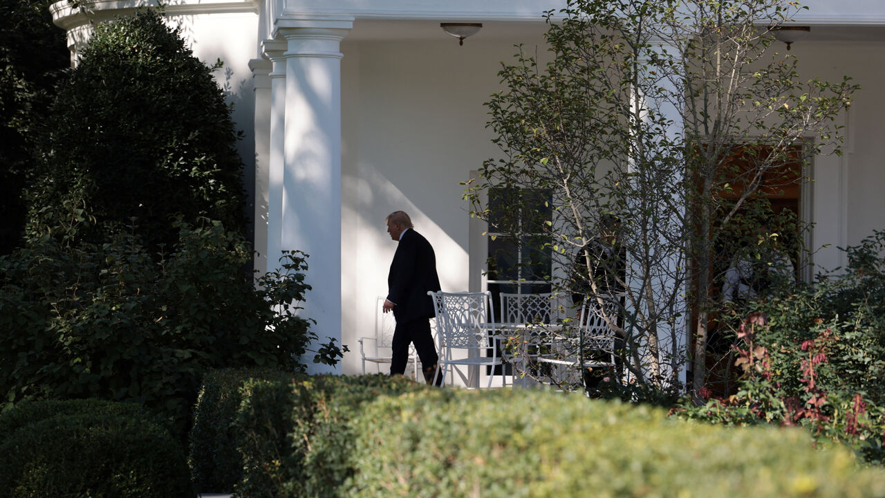 U.S. President Donald Trump walks out of the Oval Office before boarding Marine One to depart for Walter Reed National Military Medical Center from the South Lawn at the White House in Washington, D.C., U.S., October 10, 2025. REUTERS/Jessica Koscielniak