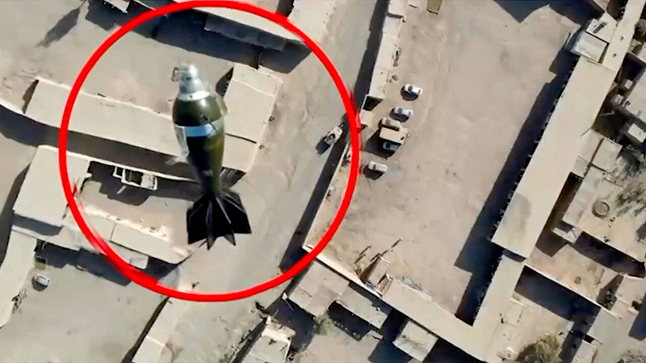 A mortar round falls towards a target from a drone, in this still image from handout video, said to show Pakistani forces conducting a strike on an Afghan Taliban border post, in Spin Boldak, Afghanistan, October 15, 2025. ISPR/Handout via REUTERS