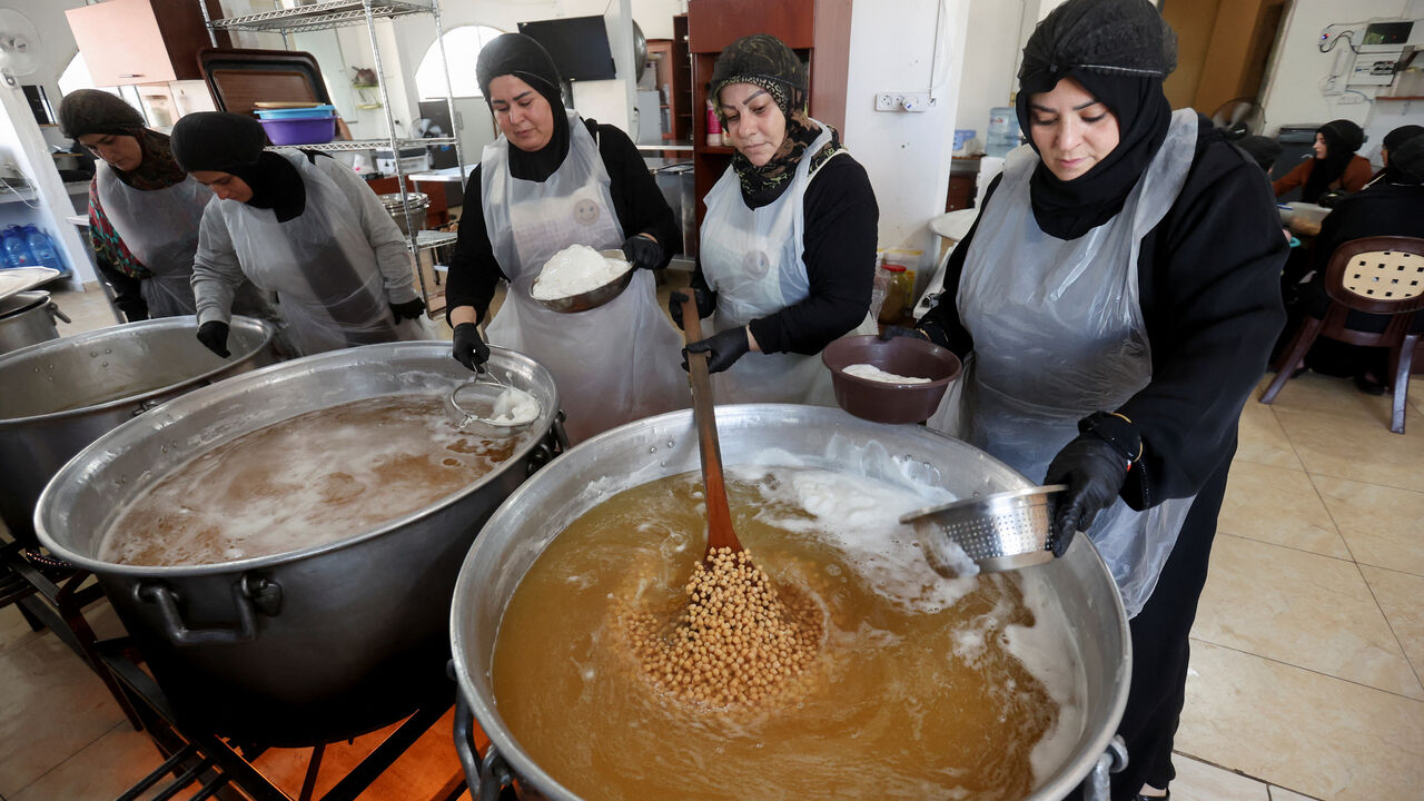 Women from Southern Lebanon prepare meals as they work in a community kitchen in Tyre, Lebanon, September 23, 2025. REUTERS/Aziz Taher
