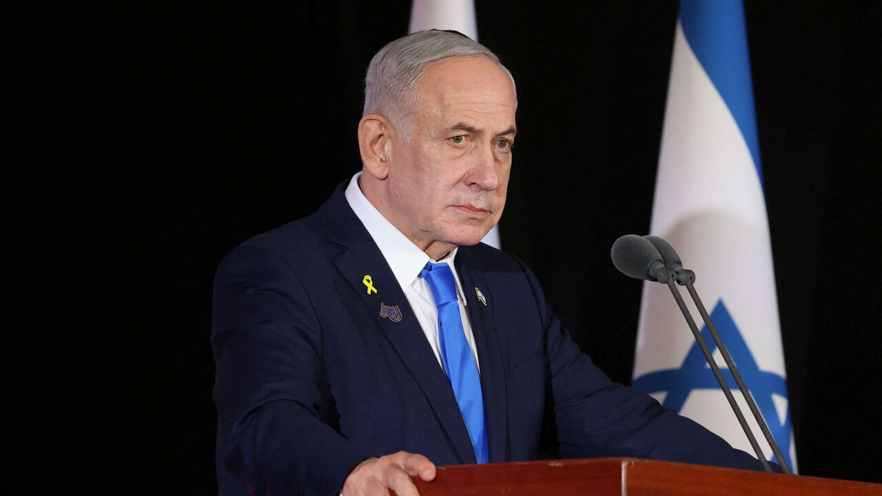 Israeli Prime Minister Benjamin Netanyahu participate in the state memorial ceremony for the fallen of the Iron Swords War on Mount Herzl. In Jerusalem on 16 October 2025    Alex Kolomoisky/POOL/Pool via REUTERS