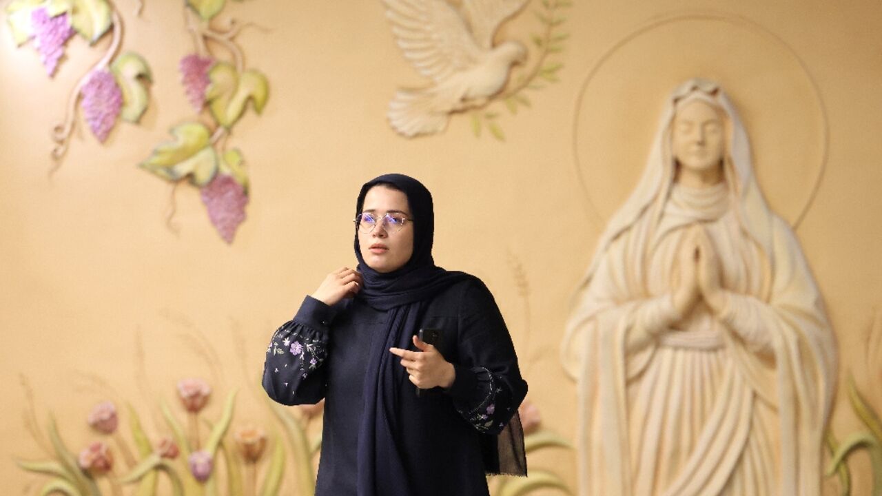 At Tehran's Maryam Moghaddas metro station religious frescoes and artworks honour Christianity's Virgin Mary, the mother of Christ