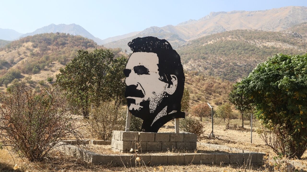 A cutout portrait of jailed PKK leader Abdullah Ocalan at the site in northern Iraq where the group announced a withdrawal of its fighters from Turkey 