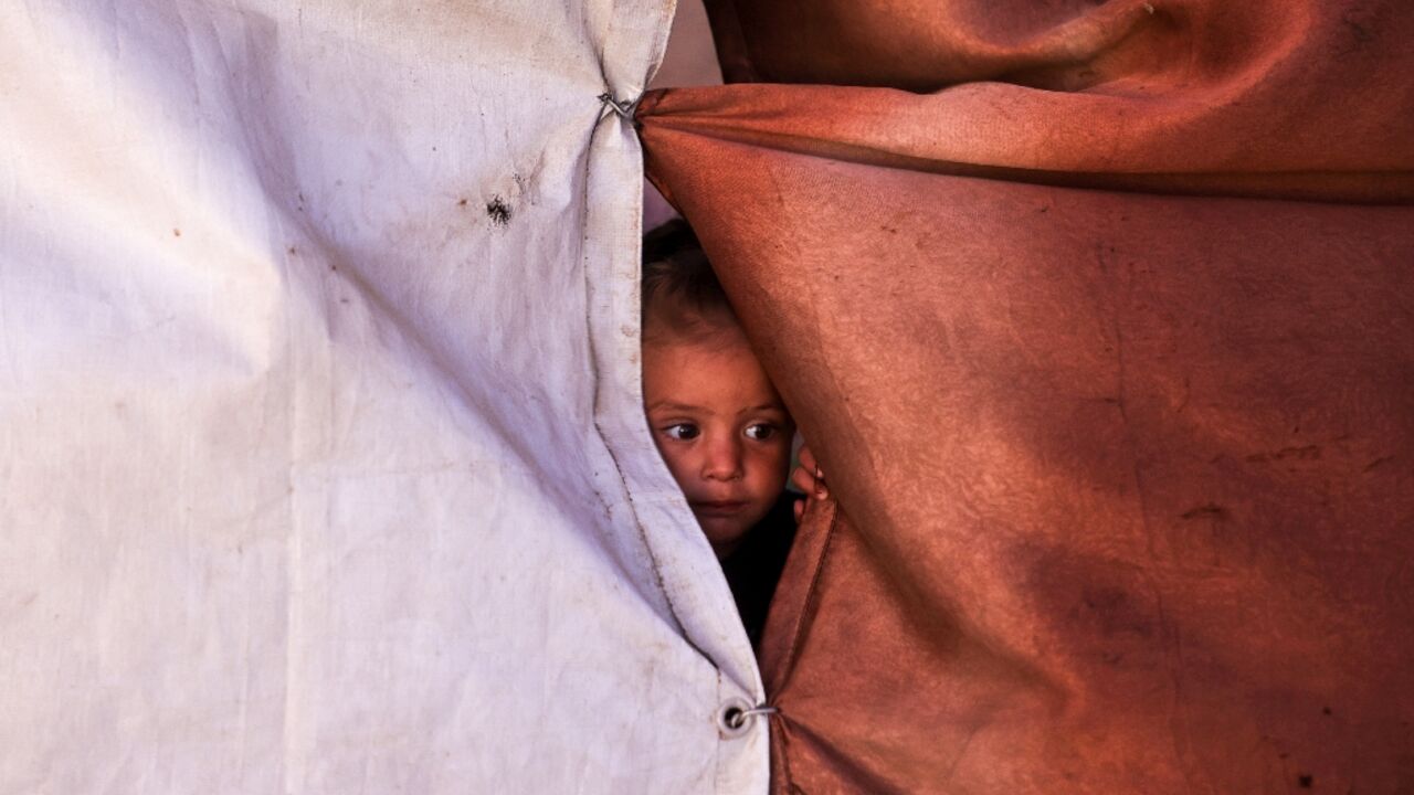 Hundreds of thousands of Palestinians are still living hand-to-mouth in makeshift tents alongside their ruined homes in Gaza, more than two weeks since the start of a US-brokered ceasefire