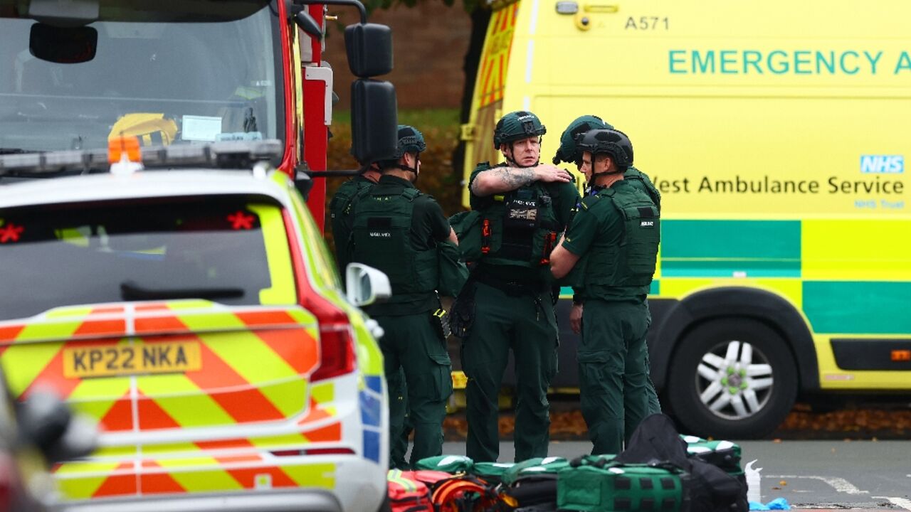 Manchester police at the scene of a car ramming and stabbing incident outside a synagogue