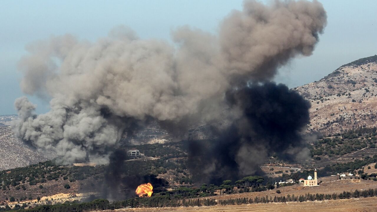 Smoke rises following an Israeli airstrike on the outskirts of the southern Lebanese village of Ej Jarmaq