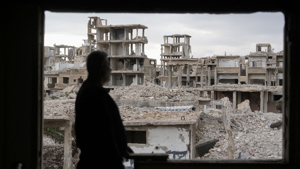 Damaged buildings at  The World Bank estimates Syria's post-war reconstruction could cost up to $216 billion