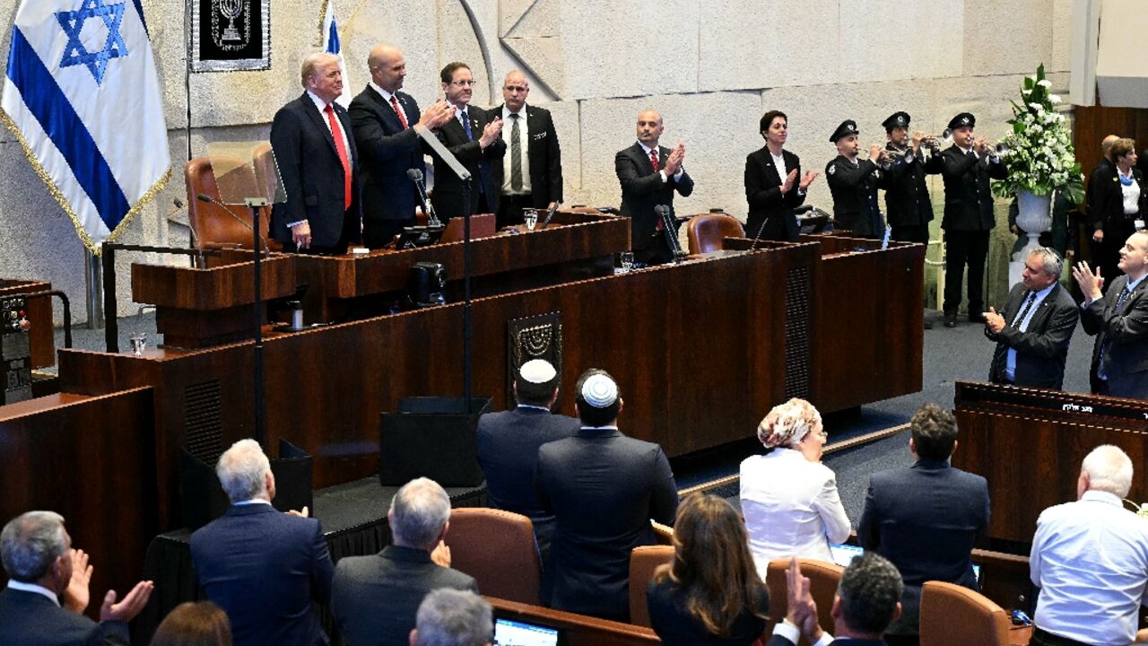 US President Donald Trump (L) received a standing ovation from the Israeli parliament, the Knesset