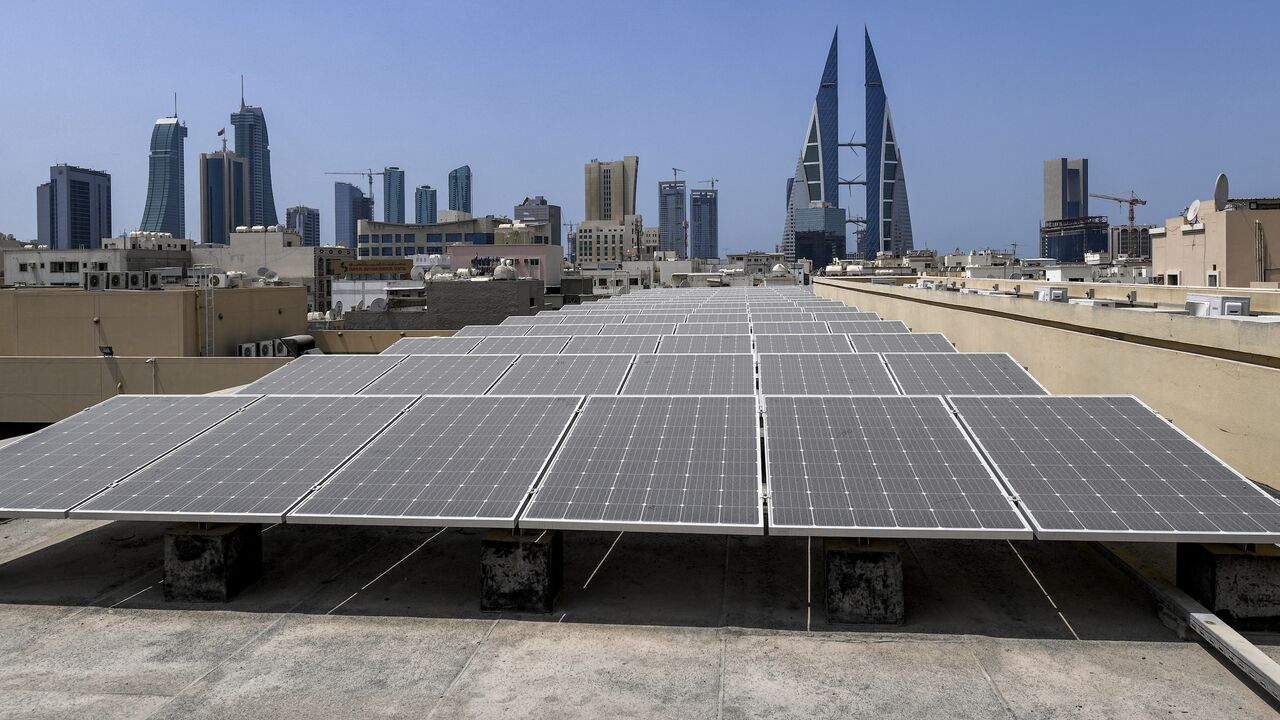 Solar panels are installed on the roof of a school in Bahrain's capital, Manama, on Aug. 25, 2022. 