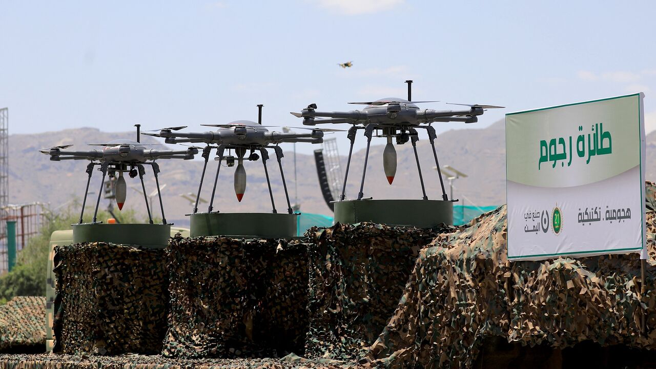 Drones are displayed on the back of a vehicle during an official military parade marking the ninth anniversary of the Houthi takeover of the capital, Sanaa, on Sept. 21, 2023.
