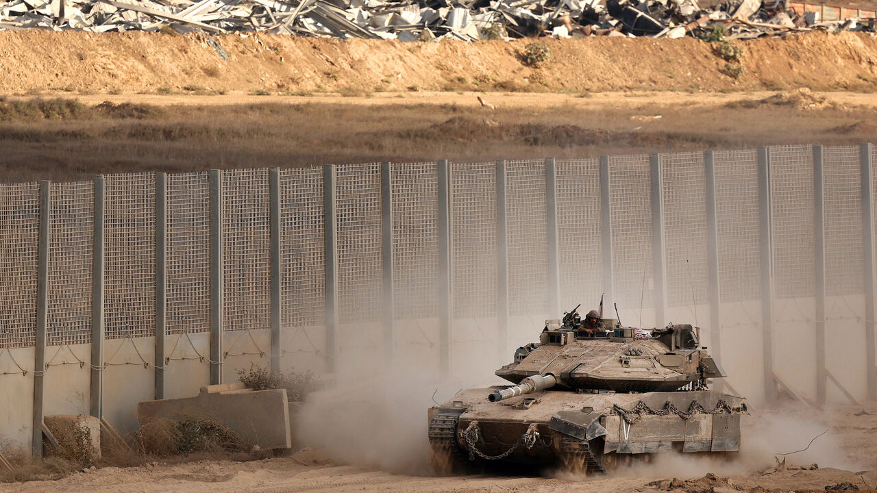 An Israeli tank moves along Israel's border with the Gaza Strip, on Sept. 25, 2025, amid the ongoing war between Israel and the Palestinian Hamas militant group. 