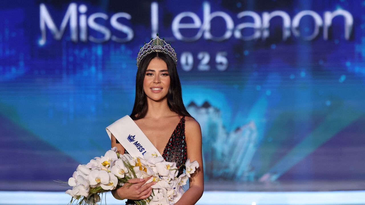 Newly elected Miss Lebanon Perla Harb poses on stage after winning the Miss Lebanon 2025 pageant, in Zouk Mosbeh, north of Beirut, on Oct. 4, 2025.