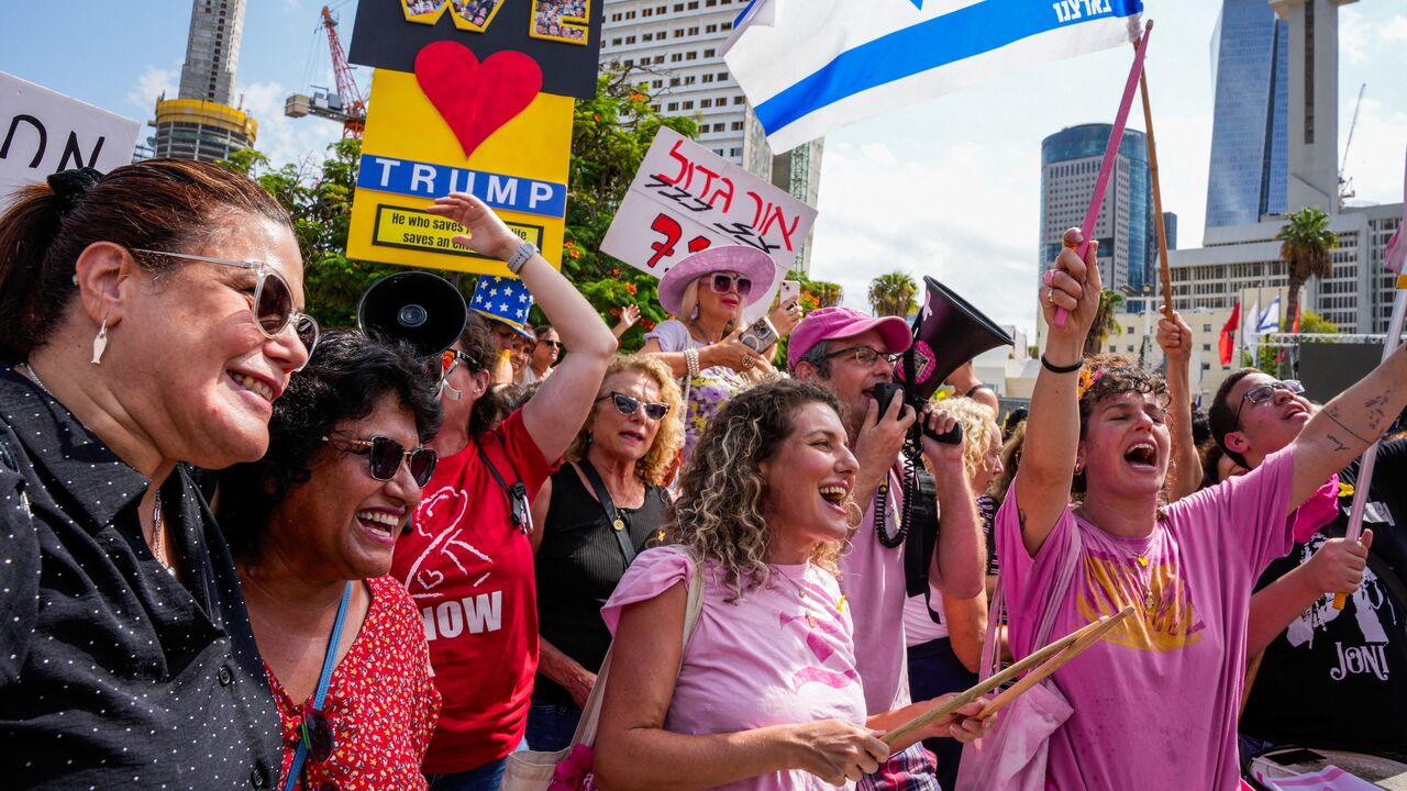 People celebrate at Hostages Square in Tel Aviv on Oct. 9, 2025, following the announcement of the new Gaza ceasefire deal. 