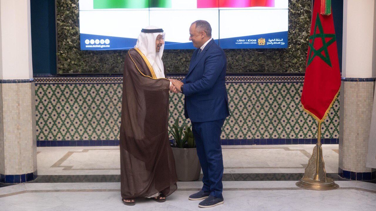 Saudi Investment Minister Khalid Al Falih with Moroccan Industry Minister Riad Mezzour