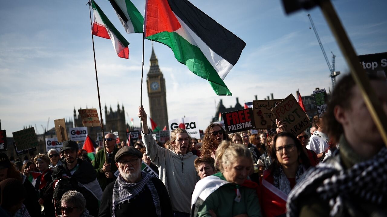 The colours of the Palestinian flag fringed the embankment of the River Thames in central London