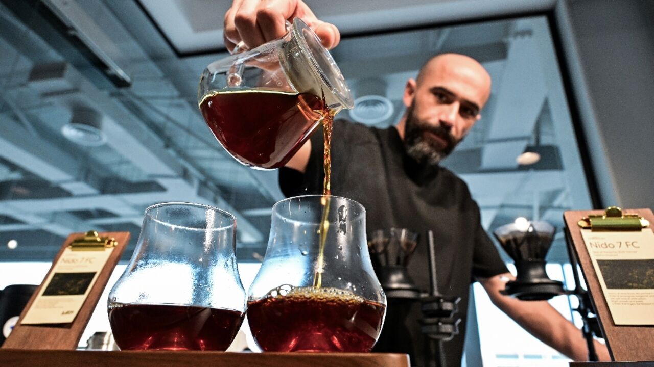 Serkan Sagsoz prepares the world's most expensive coffee