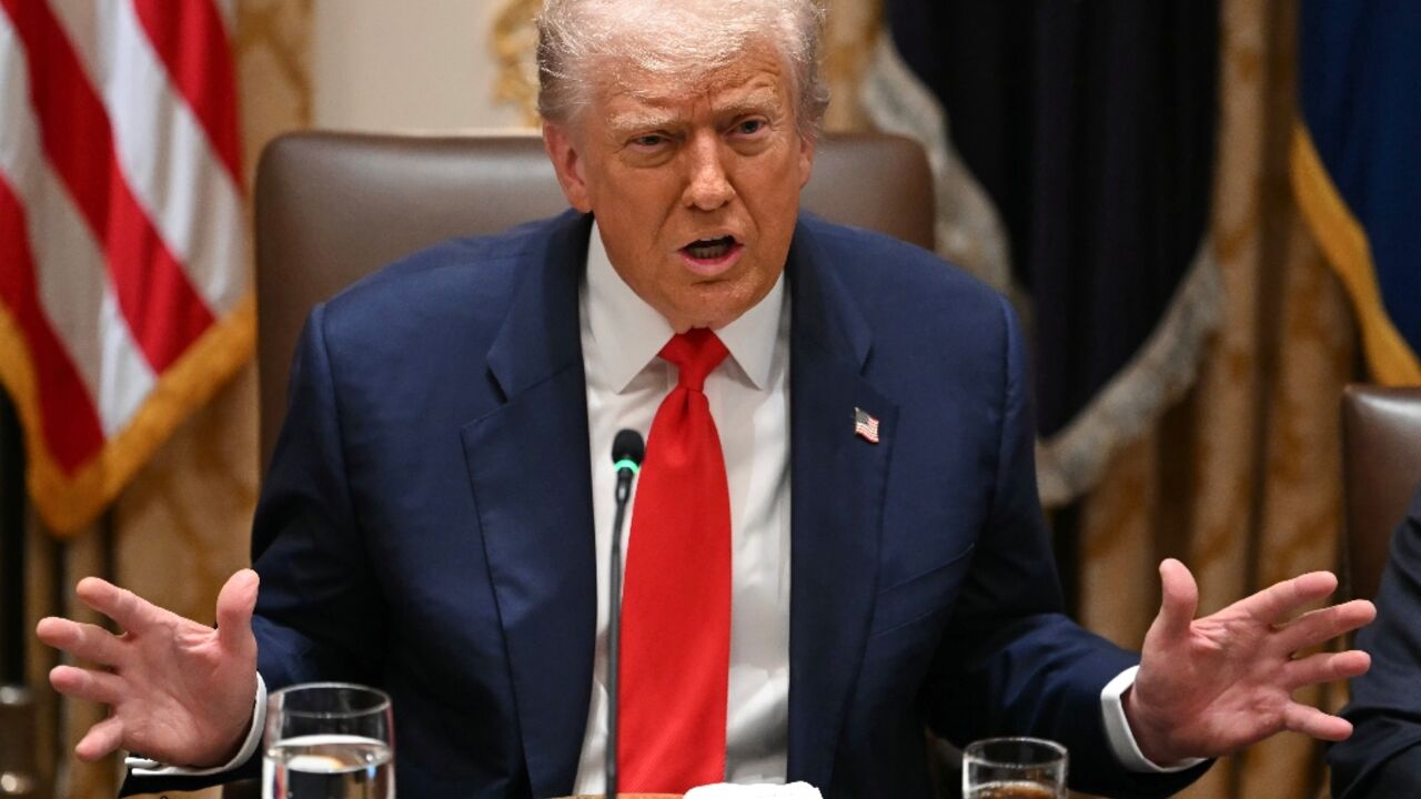 US President Donald Trump speaks during a meeting with Argentina's President Javier Milei at the White House in Washington, DC, on October 14, 2025.