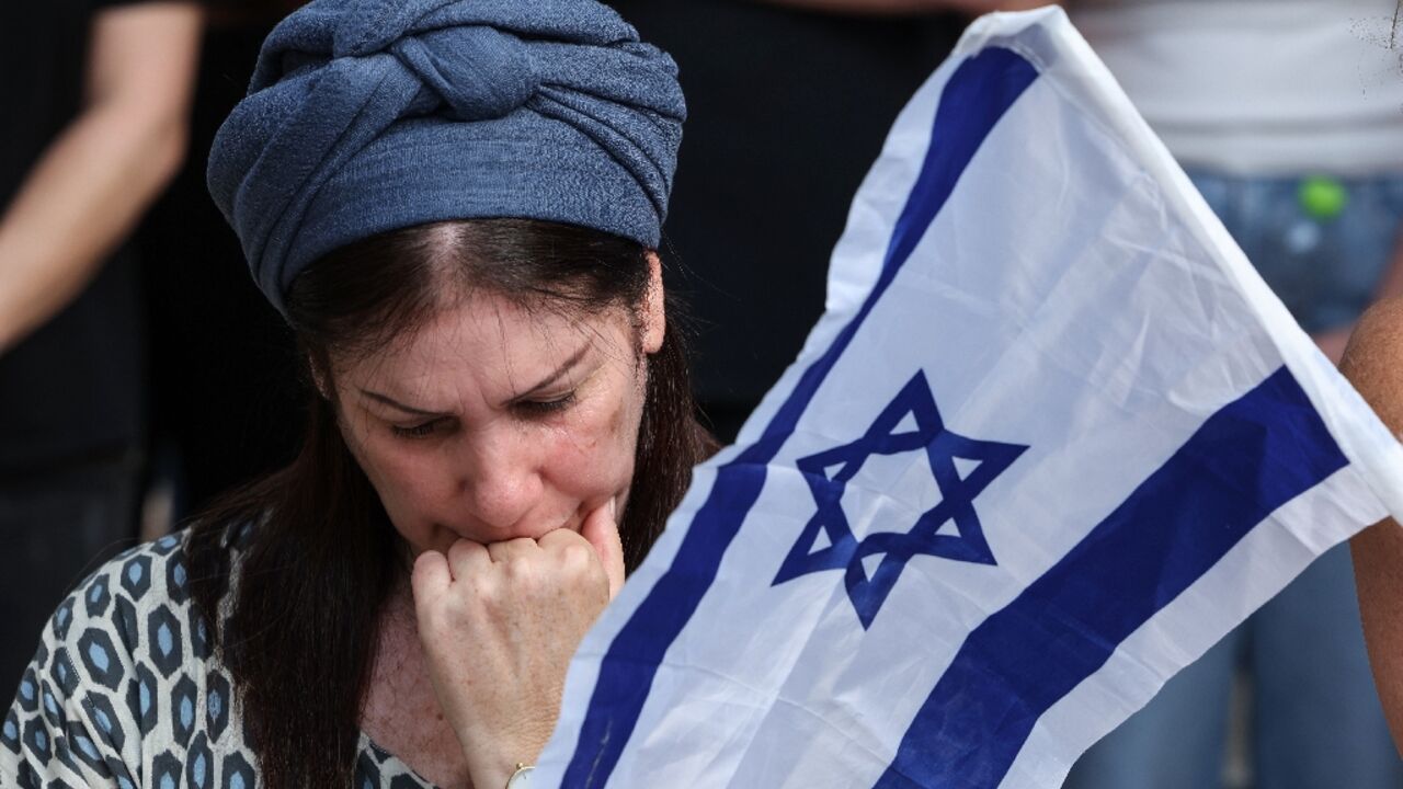 Israeli hostage families continue to mourn -- here at the funeral of 19-year Corporal Oz Daniel who was killed by Palestinian militants in the October 7, 2023 attacks and whose body was taken to Gaza, as slain captives are returned one by one