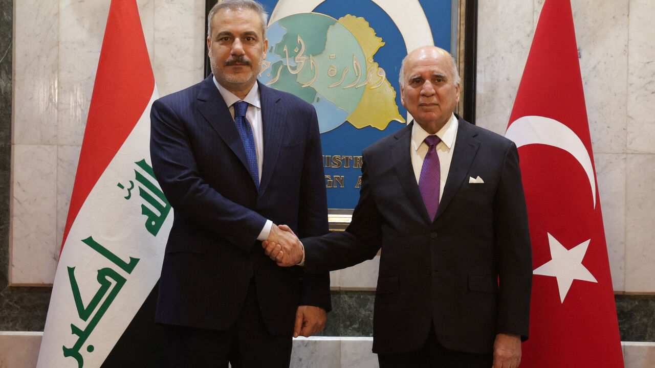 Turkish Foreign Minister Hakan Fidan meets Iraqi Foreign Minister Fuad Hussein in Baghdad, Iraq November 2, 2025. REUTERS/Ahmed Saad