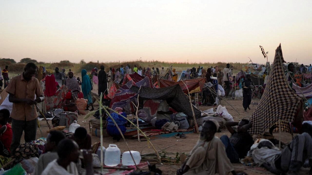 A general view of people sitting at a camp for displaced families who fled from al-Fashir to Tawila, North Darfur, Sudan, October 27, 2025. REUTERS/Mohammed Jamal