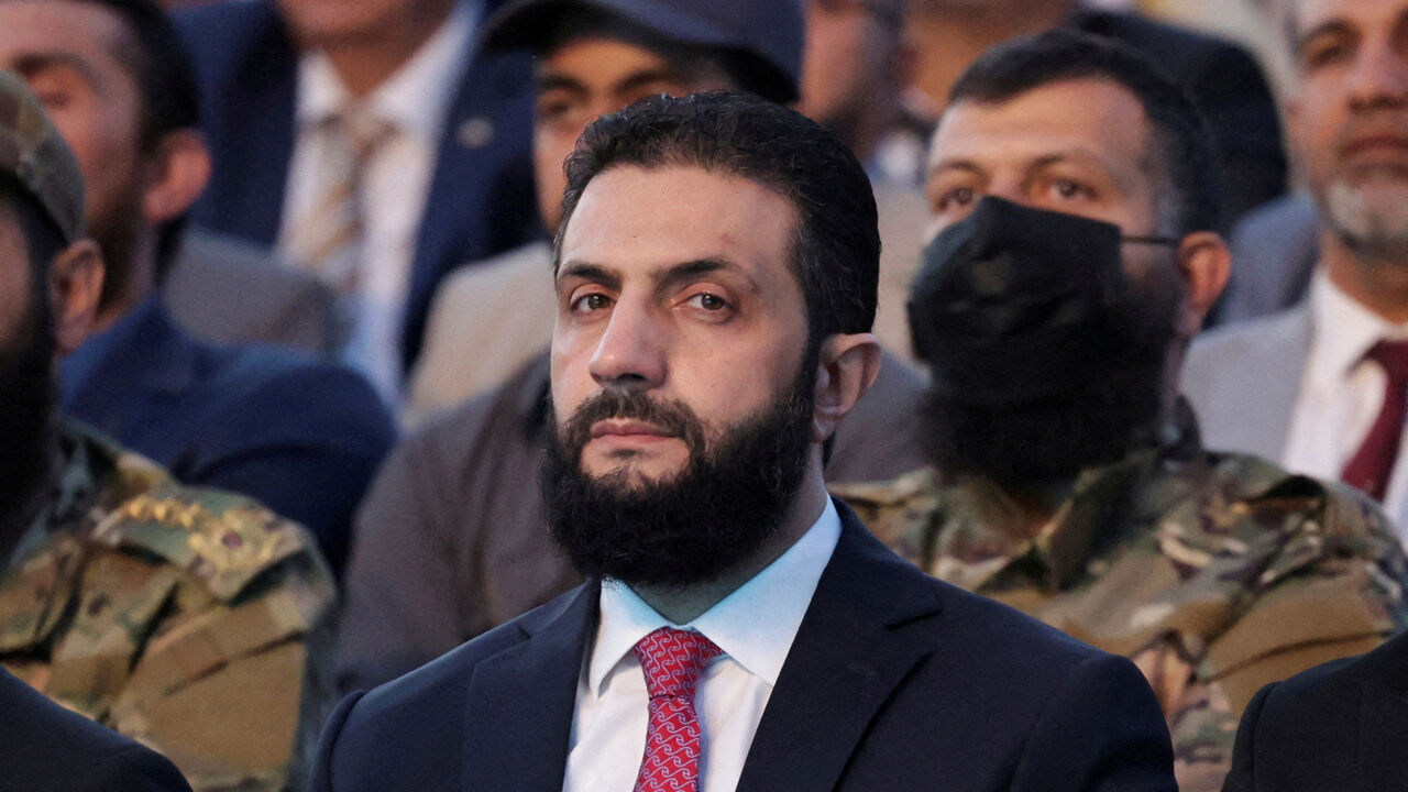 FILE PHOTO: Syria’s interim President Ahmed al-Sharaa looks on as he attends the “Aleppo, Key to Victory” celebration marking Syria’s liberation, in Aleppo, Syria May 27, 2025. REUTERS/Khalil Ashawi/File Photo