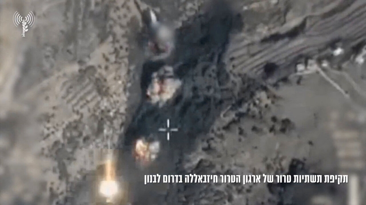 Smoke and fire rise from Israeli air strikes on what the Israeli military called as Hezbollah targets, in Al-Mahmoudiya, southern Lebanon,  in this screengrab taken from a handout video released on October 30, 2025.  Israeli Military/Handout via REUTERS