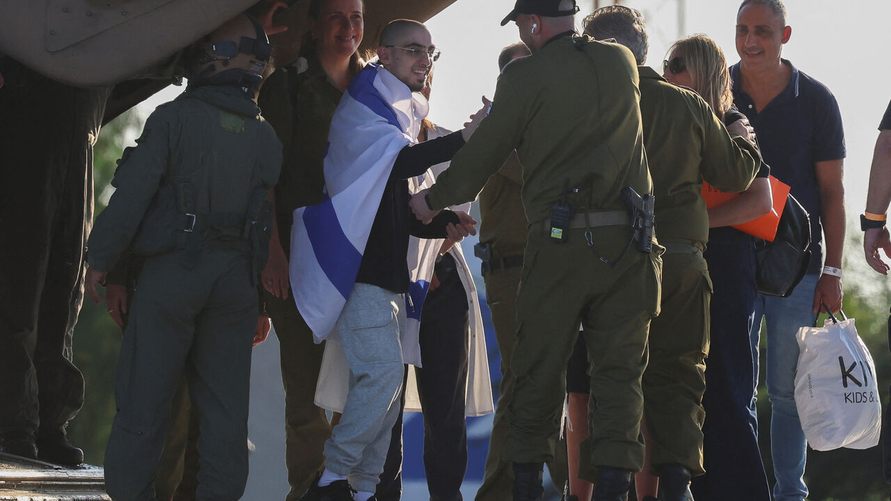 Rom Braslavski, a released hostage who was kidnapped during the deadly October 7, 2023 attack by Hamas and taken to Gaza, arrives at Sheba Medical Center, amid a ceasefire between Israel and Hamas in Gaza, in Ramat Gan, Israel October 13, 2025. REUTERS/Hannah McKay