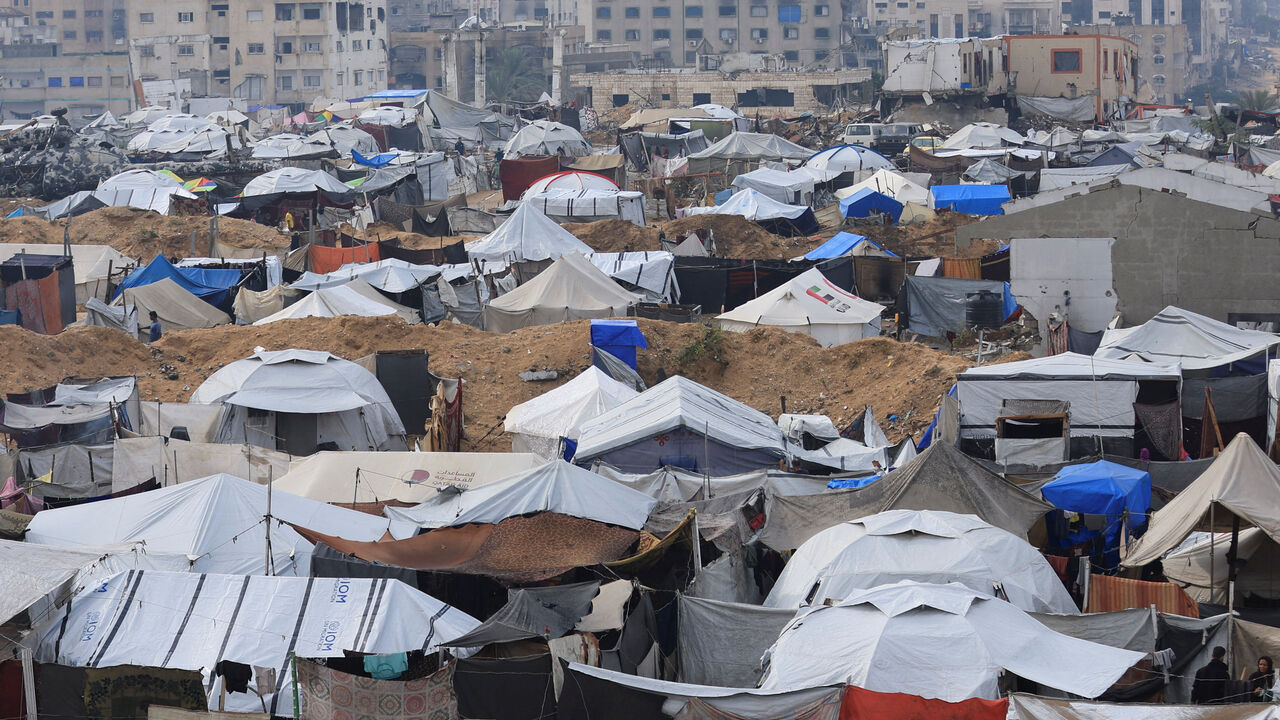 Palestinian-tent shelter on a rainy day, during a ceasefire between Israel and Hamas, in Gaza City, November 14, 2025. REUTERS/Dawoud Abu Alkas