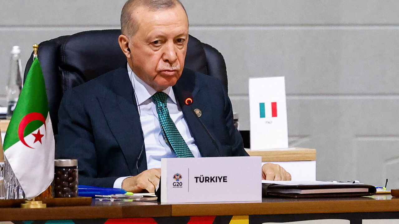Turkey's President Tayyip Erdogan attends a plenary session on the opening day of the G20 Leaders' Summit at the Nasrec Expo Centre in Johannesburg, South Africa, November 22, 2025. REUTERS/Thomas Mukoya/Pool