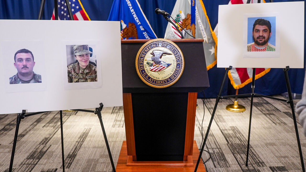Pictures of National Guard members Andrew Wolfe and Sarah Beckstrom, who were shot on November 26 in Washington, are displayed next to a picture of the suspect of the shooting, Afghan national Rahmanullah Lakanwal, on the day of a press conference with FBI Director Kash Patel, U.S. Attorney for D.C. Jeanine Pirro and other authorities, in Washington, D.C., U.S., November 27, 2025. REUTERS/Nathan Howard