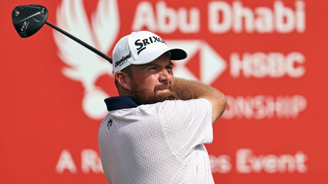 Shane Lowry driving toward a first-round 64 in Abu Dhabi 