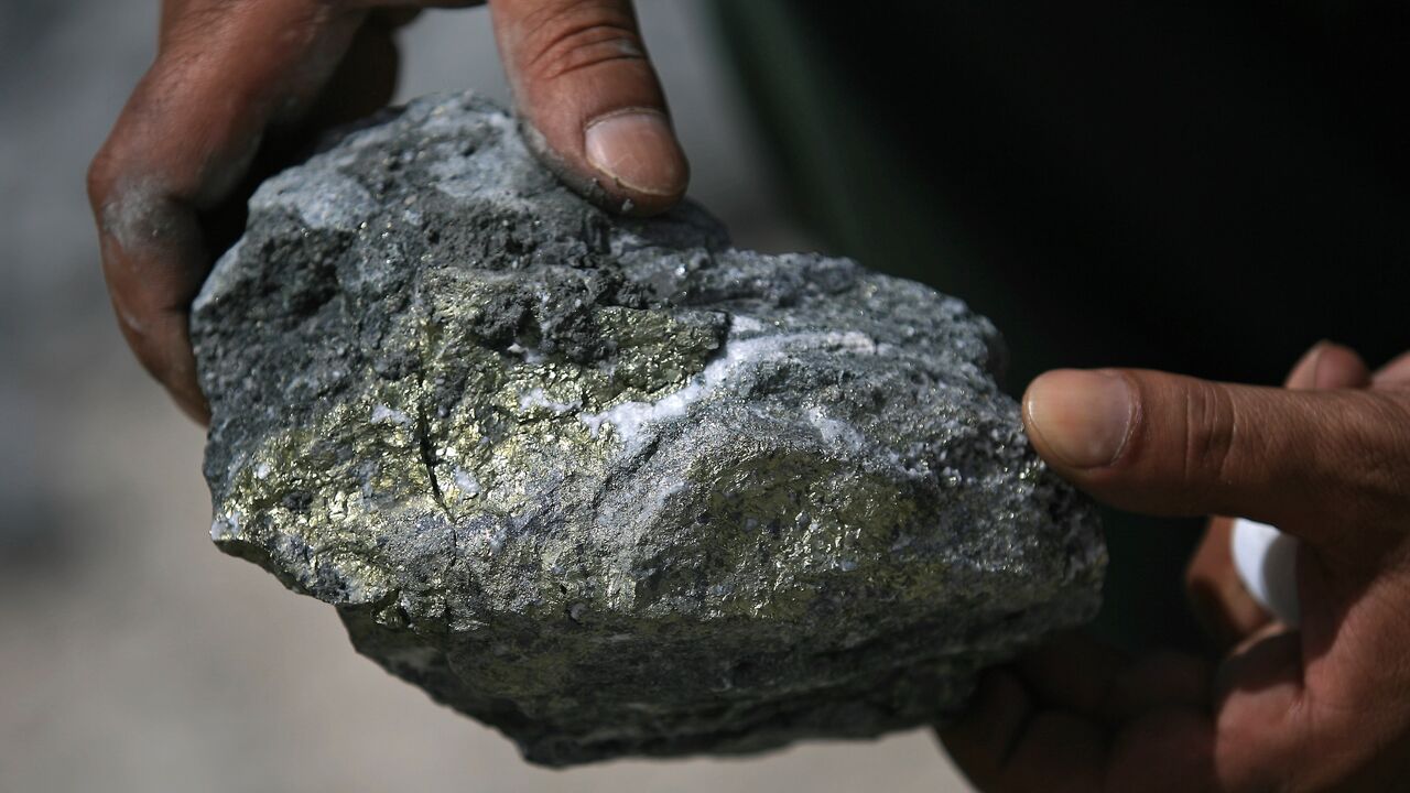Spots of gold-rich ore speckle a stone pictured during a press tour at the Al-Amar Gold Mine, in the Riyadh region on May 28, 2008.